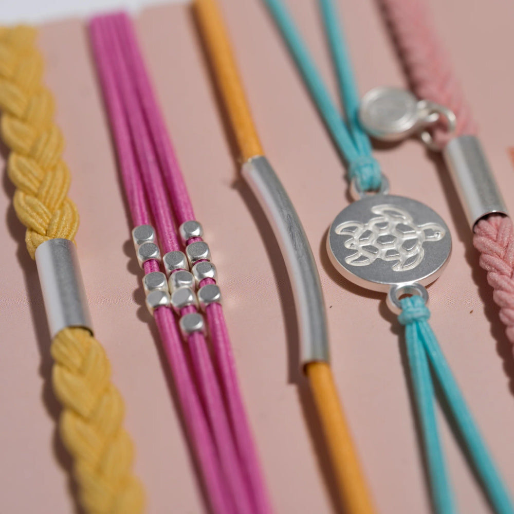 EMBRACE HAIR TIE BRACELET