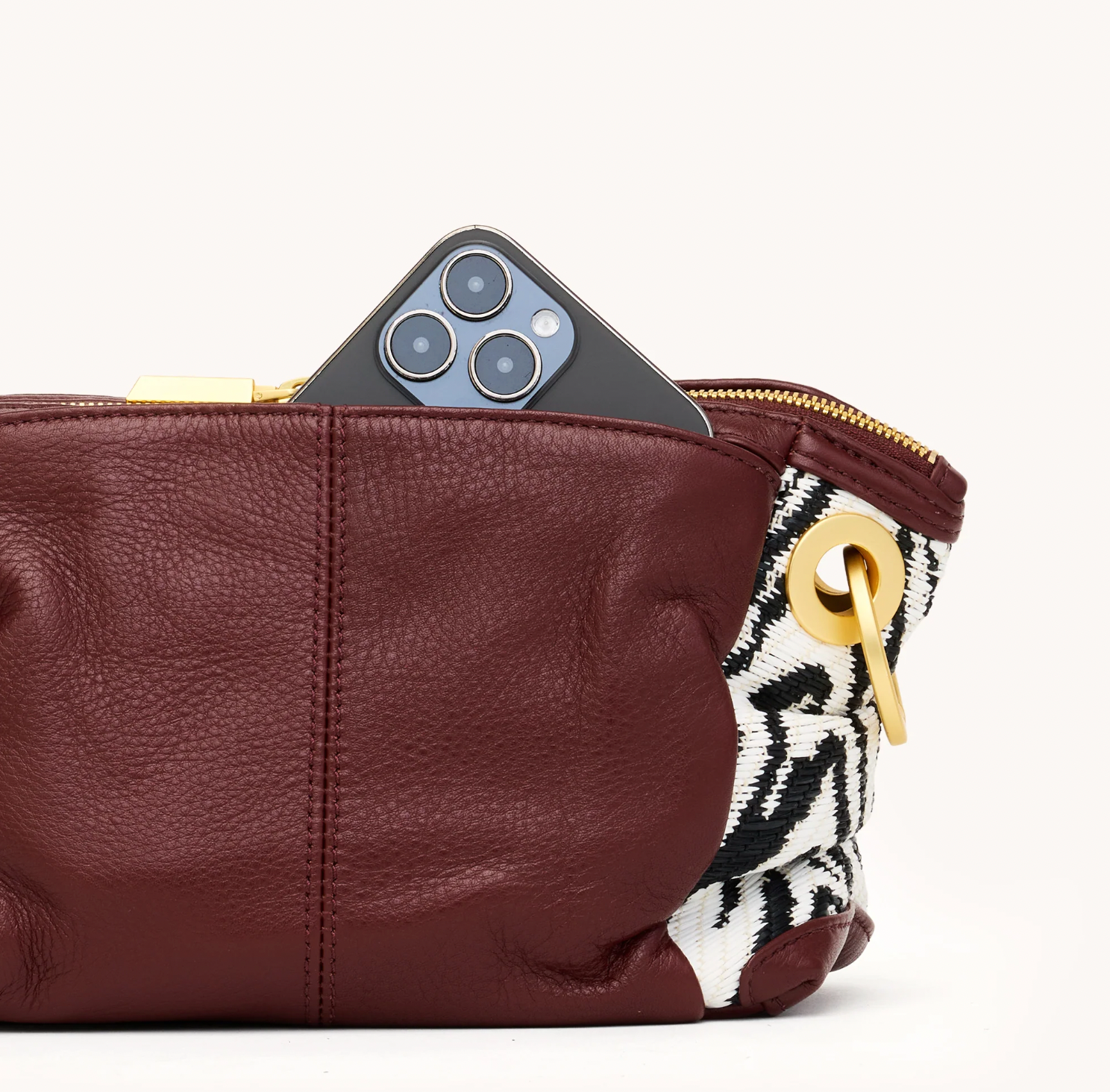 DANIEL CROSSBODY CLUTCH SML ZEBRA